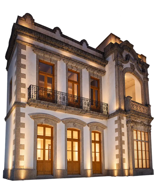 Fachada iluminada de noche de la casa de Calle Marsella 45, sede de la Founders & Investors House