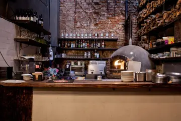 Barra y horno de leña de Cancino Havre